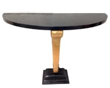 An Art Deco style pedestal hall table.