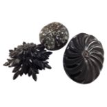 Three Whitby Jet brooches.