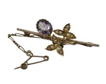 An amethyst and seed pearl bar brooch, apparently unmarked. CONDITION REPORT: 3.
