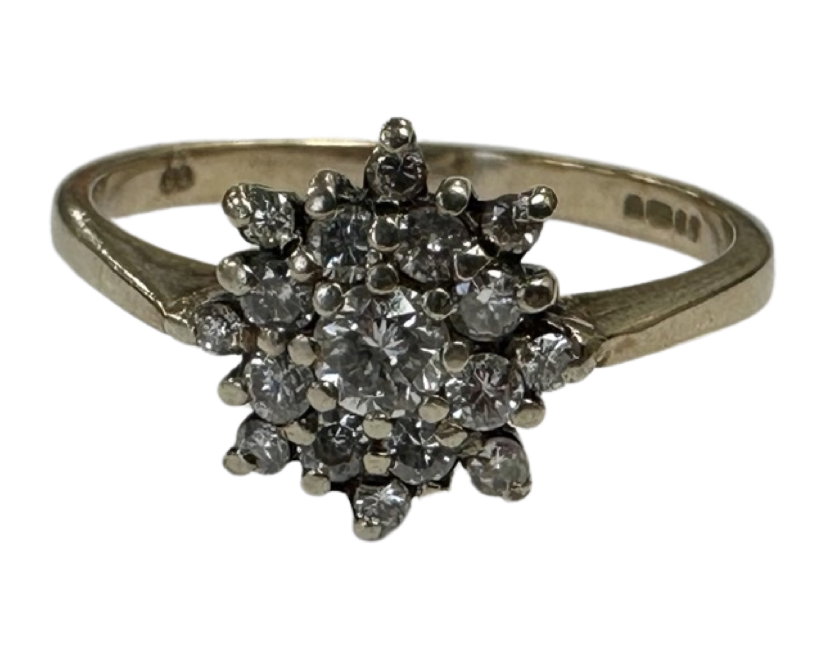 A 9ct gold diamond set cluster ring, size O. CONDITION REPORT: 2.