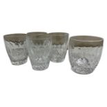 A set of four Waterford Crystal 'Colleen' tumblers, height 9cm, together with a similar tumbler,