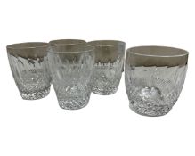 A set of four Waterford Crystal 'Colleen' tumblers, height 9cm, together with a similar tumbler,