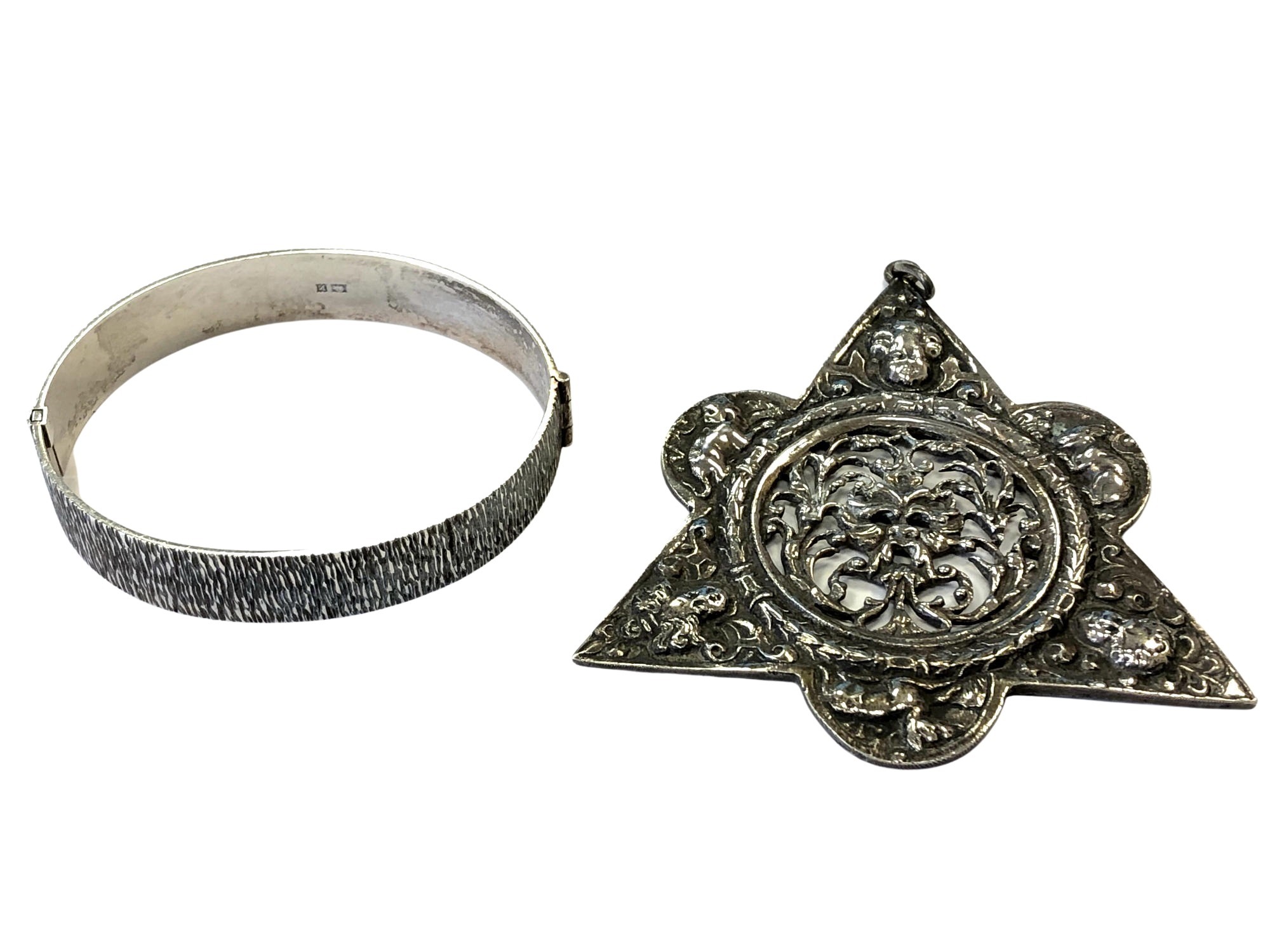 An unusual Italian silver pendant and a silver bangle