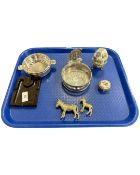 A brown Bakelite RAFA ashtray, Arthur Price coaster, two metal donkey figures, Peacock ornament,
