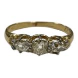 An 18ct gold three stone old-cut diamond ring, the total diamond weight estimated at 0.