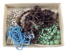 Two boxes containing a collection of costume jewellery including bracelets, earrings,