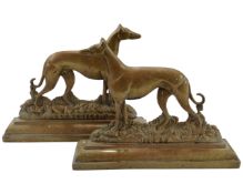 A pair of 19th century brass greyhound fireside ornaments.