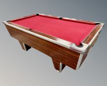 A HGM Superleague coin operated pool table, with set of pool balls, three cues, a triangle,