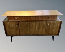 A mid-20th century teak G Plan E. Gomme sideboard.