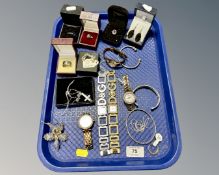A tray containing costume jewellery, silver rings, assorted wristwatches including Dolce & Gabbana,