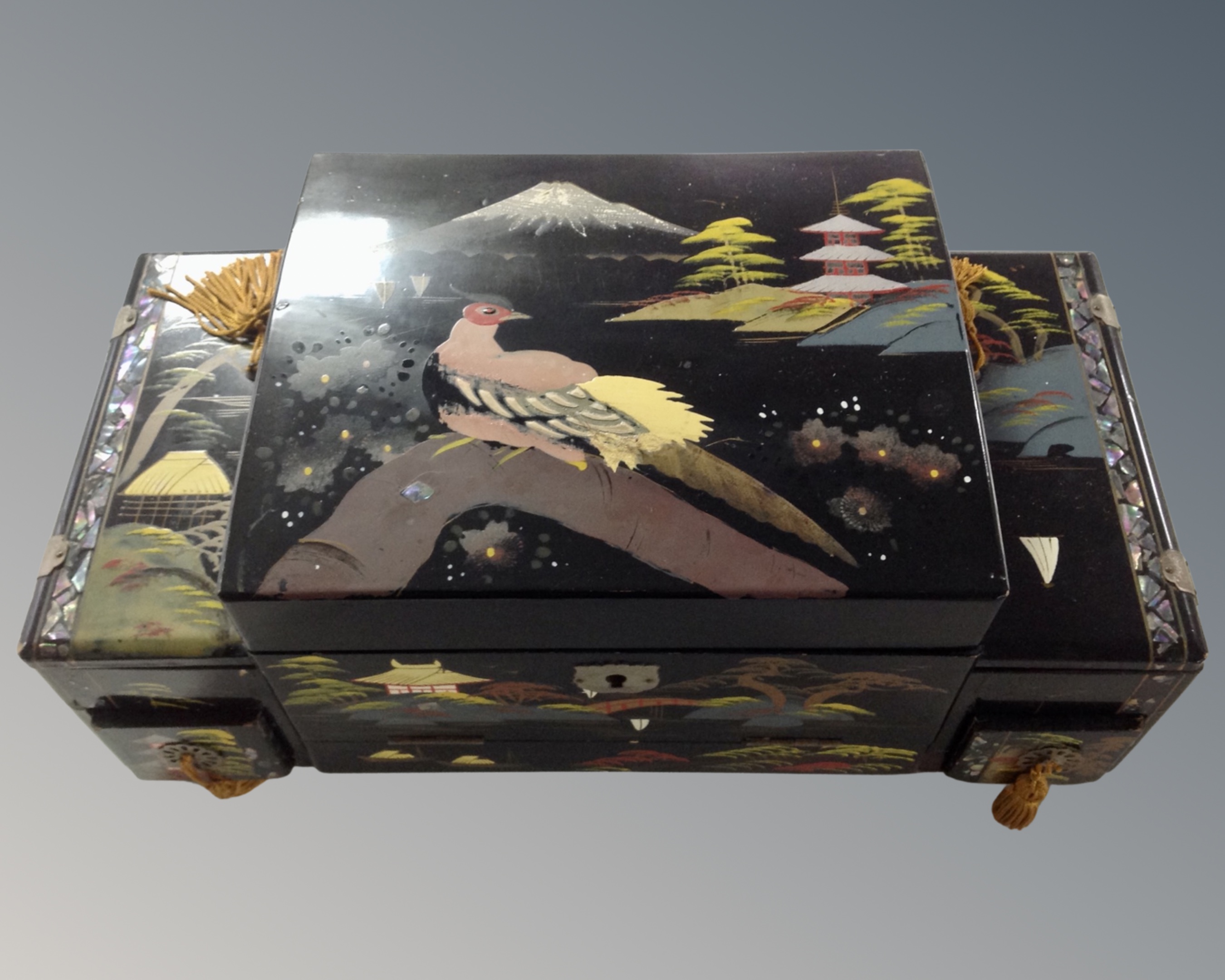 A 20th century Chinese lacquered musical jewellery box.