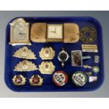 A tray containing enamelled badges including public service vehicle driver and conductor badge,