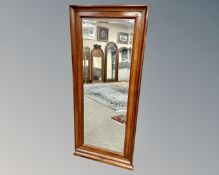 A 19th century mahogany bevelled mirror, 57cm by 136cm.