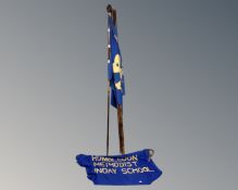A Girl Guide flag pole,
