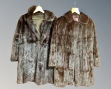 Two mink fur coats.