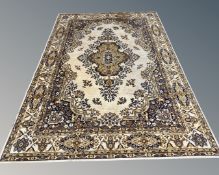 A machined Abusson style rug, 203cm by 293cm.