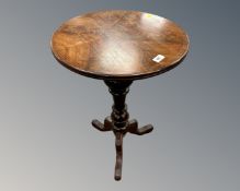 A 19th century mahogany pedestal occasional table.