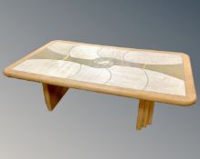 A Scandinavian tile topped rectangular coffee table with matching lamp table.