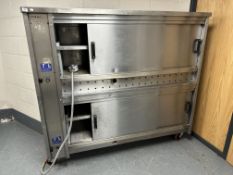 A stainless steel two tier hot cupboard.