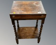 A 19th century carved oak barley twist hall chair together with a cutlery canteen on barley twist