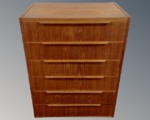 A mid-20th century teak six drawer chest.