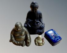 A bronze Buddha incense burner together with two further brass and bone Buddha figures together
