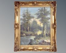Continental school : River through a rural landscape, oil on canvas, in ornate gilt frame.