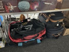 Three luggage cases together with three further holdalls.