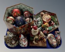 A tray containing assorted Christmas tree decorations together with a Walt Disney showcase