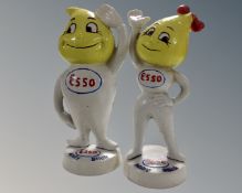 A pair of cast iron novelty Esso Andy and Abby Slick money boxes.