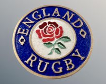 A cast iron England rugby wall plaque.