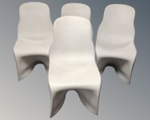 A set of four Fabio Novembre moulded plastic chairs (two masculine,