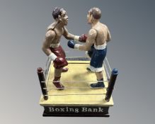 A cast iron novelty boxers money box.