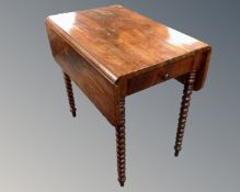 A 19th century mahogany flap sided table fitted with a drawer, on bobbin legs, height 77 cm,