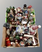 Two boxes containing a large quantity of Christmas ornaments including candle holders,