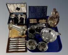 A tray containing assorted plated wares, cased cutlery, a three-piece Craftsman pewter tea service.