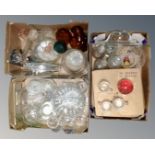 Three boxes containing assorted glassware including decanters, paperweight, punch bowl sets,