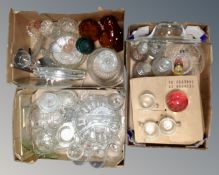 Three boxes containing assorted glassware including decanters, paperweight, punch bowl sets,