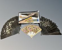 A collection of antique and later fans.