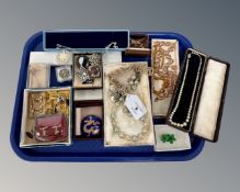 A tray of costume jewellery, cuff links,