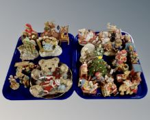 Two trays containing a large quantity of Christmas ornaments and plates including Priscilla Hillman