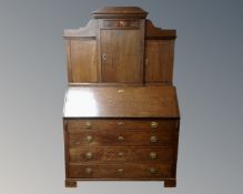 A 19th century oak bureau bookcase.