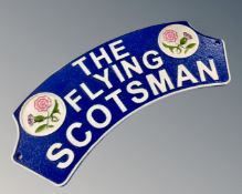 A cast iron Flying Scotsman wall plaque.