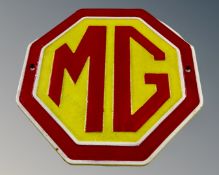 A cast iron MG wall plaque.