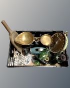A box containing vintage kitchenalia, a green glass oil lamp, wooden scoop, Rolls-Royce engine cap.