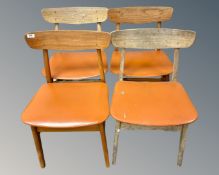 A set of four 20th century Danish teak dining chairs.