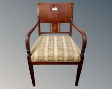 A 20th century inlaid mahogany armchair with tapestry seat.
