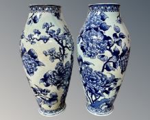 A pair of Bleu Hortensia blue and white vases, height 32cm.