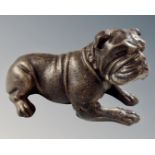 A cast iron figure of a bulldog.