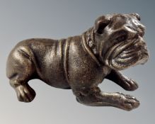 A cast iron figure of a bulldog.